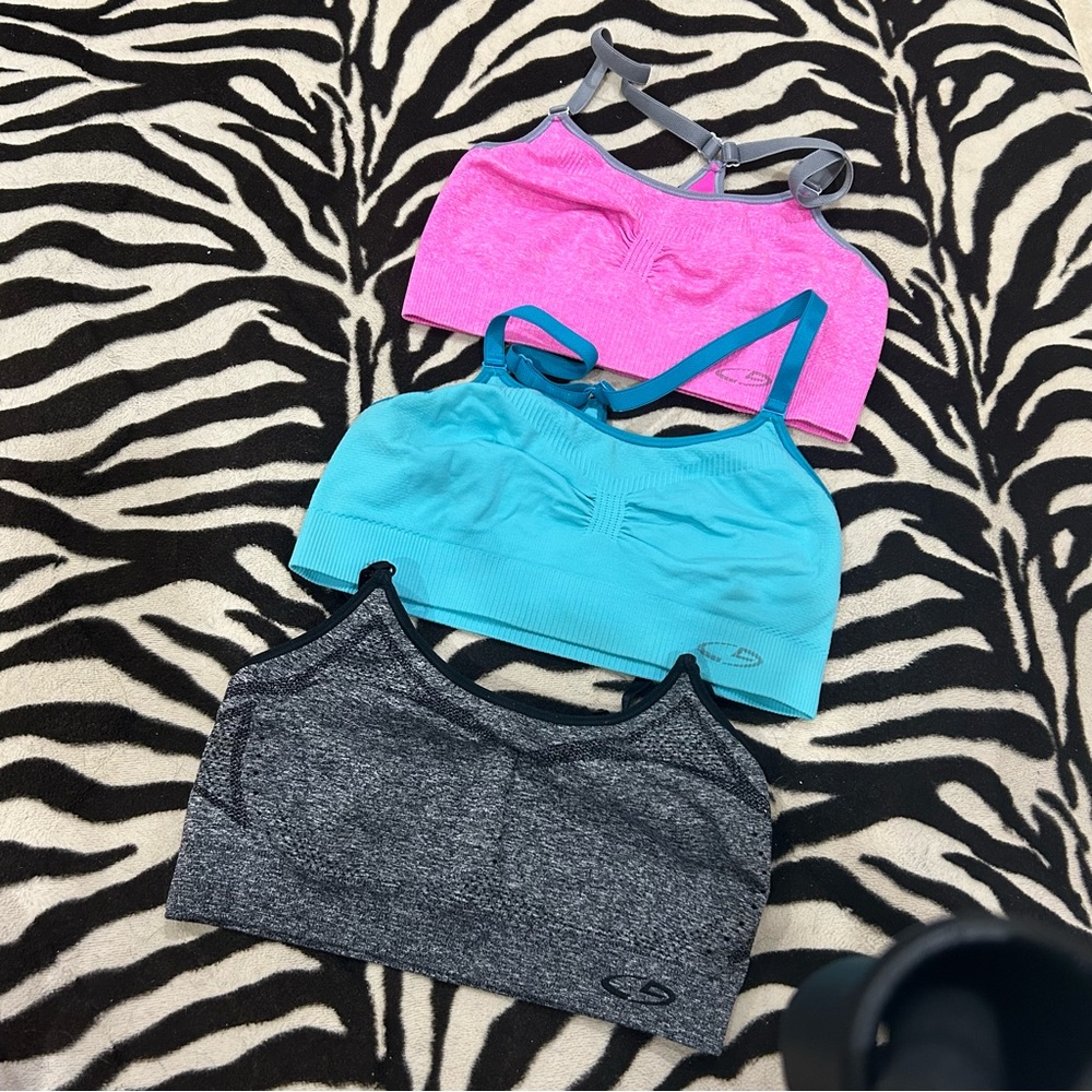 Pink, Blue, black/gray sports bras lot of 3
Excellent condition